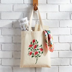 توت بگ پارچه ای متقال گرم بالای نقاشی دست با بند کنفی